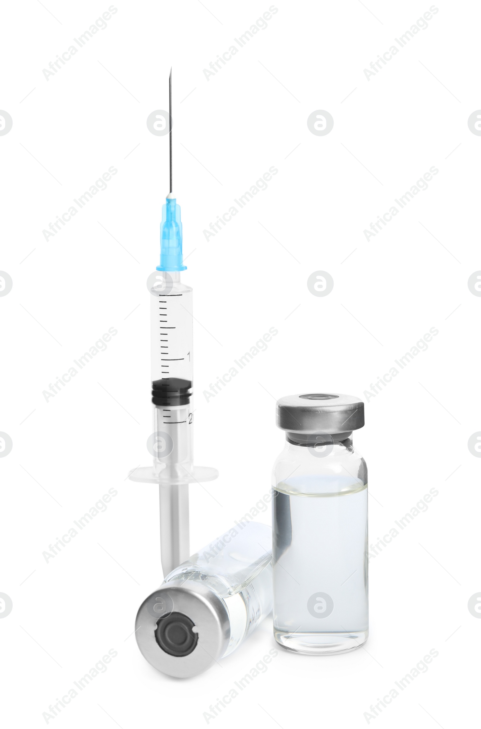 Photo of Vials and syringe on white background. Vaccination and immunization