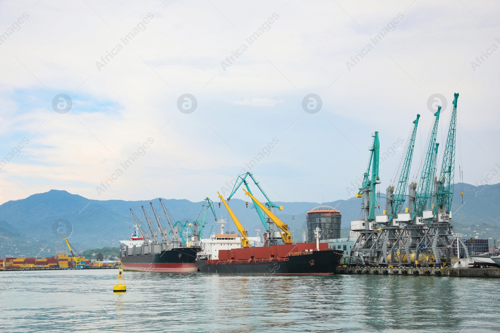 Photo of Shipyard with cranes and vessels on water