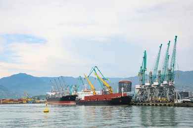 Photo of Shipyard with cranes and vessels on water