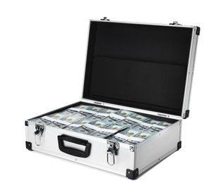 Open suitcase full of money on white background