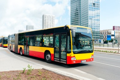 Photo of Modern bus on city street. Public transport