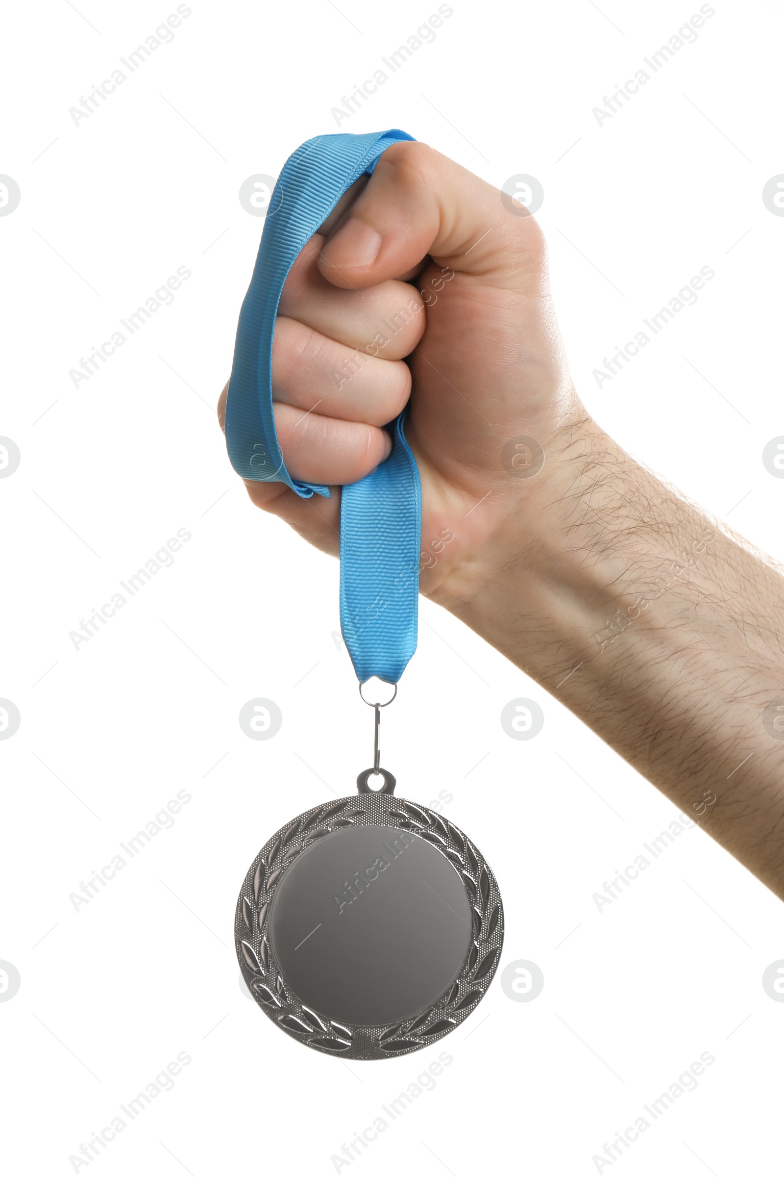 Photo of Man holding silver medal on white background, closeup. Space for design