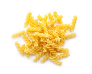 Uncooked fusilli pasta on white background, top view