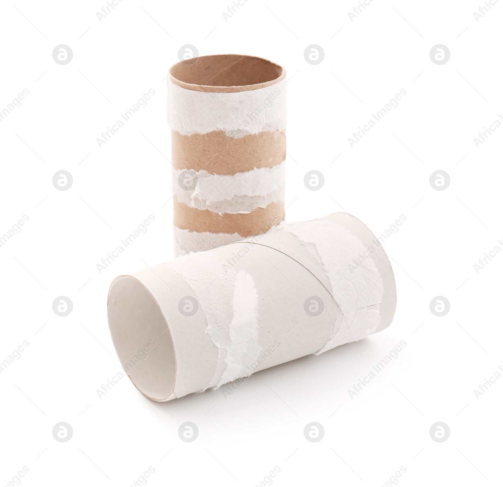 Photo of Empty paper toilet rolls on white background