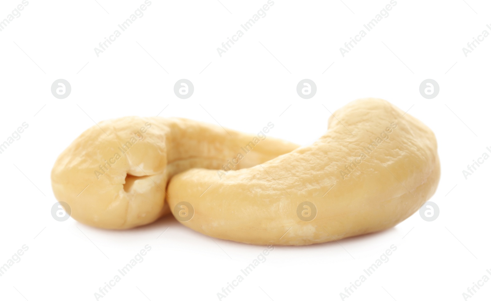 Photo of Tasty organic cashew nuts isolated on white