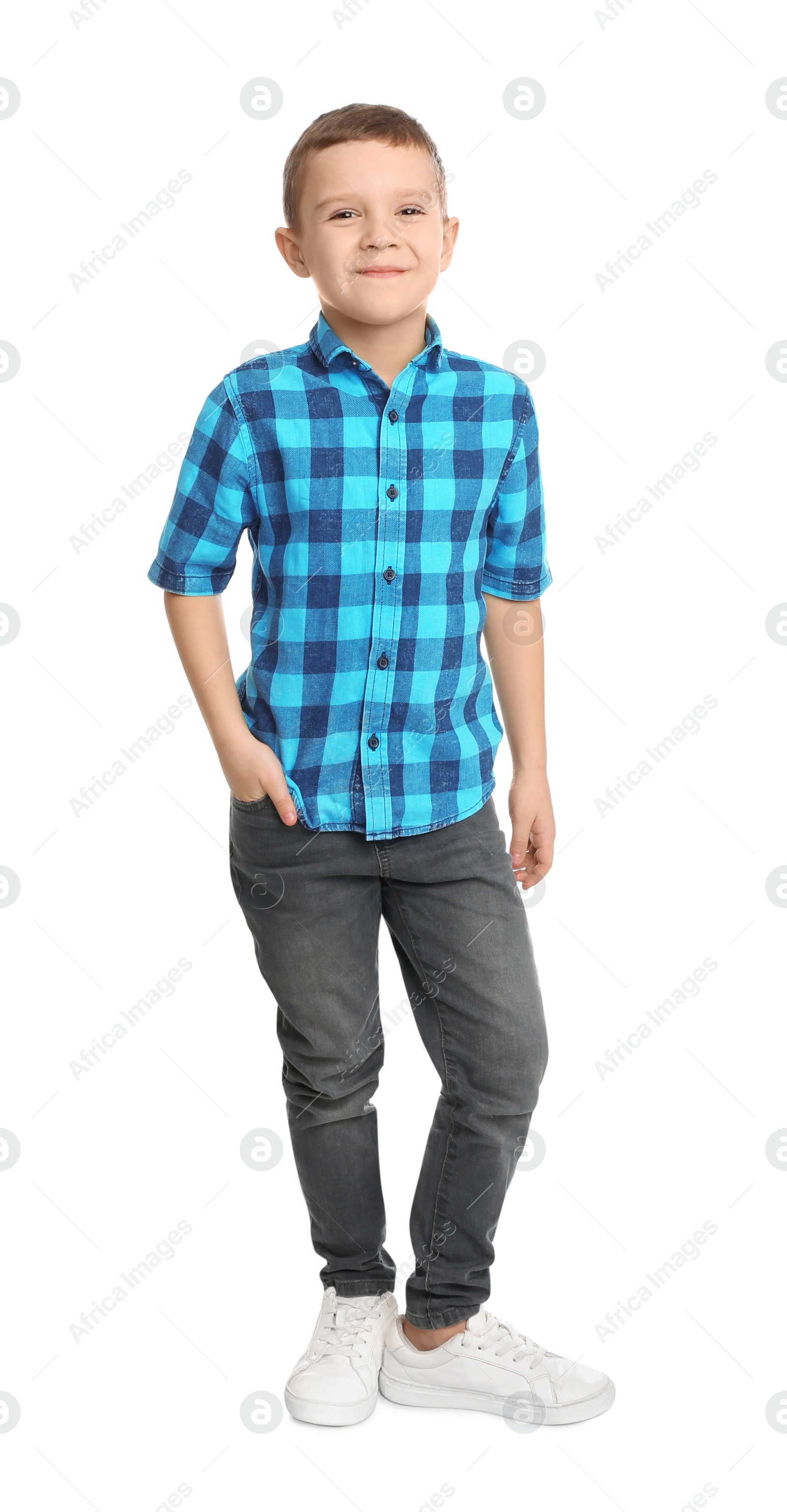 Photo of Portrait of cute little boy on white background