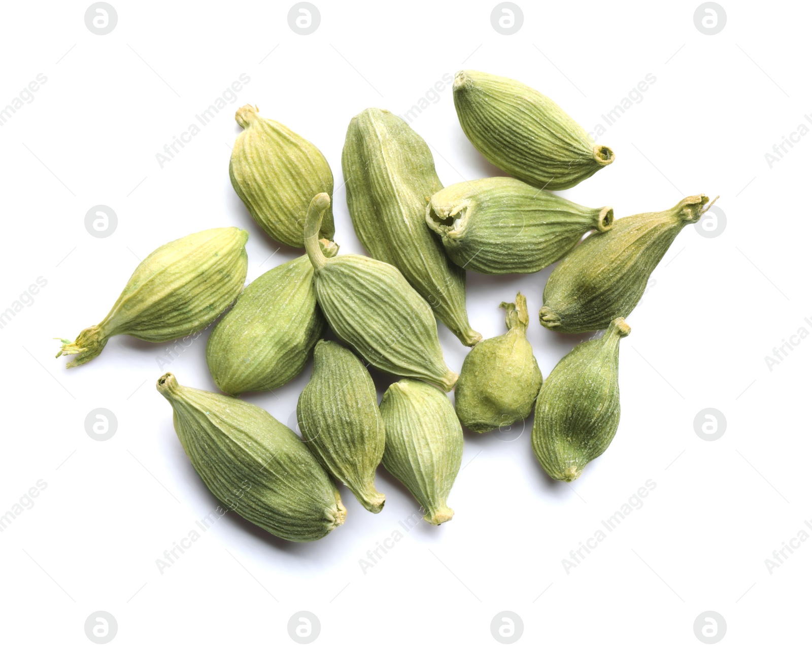 Photo of Pile of dry green cardamom pods on white background, top view