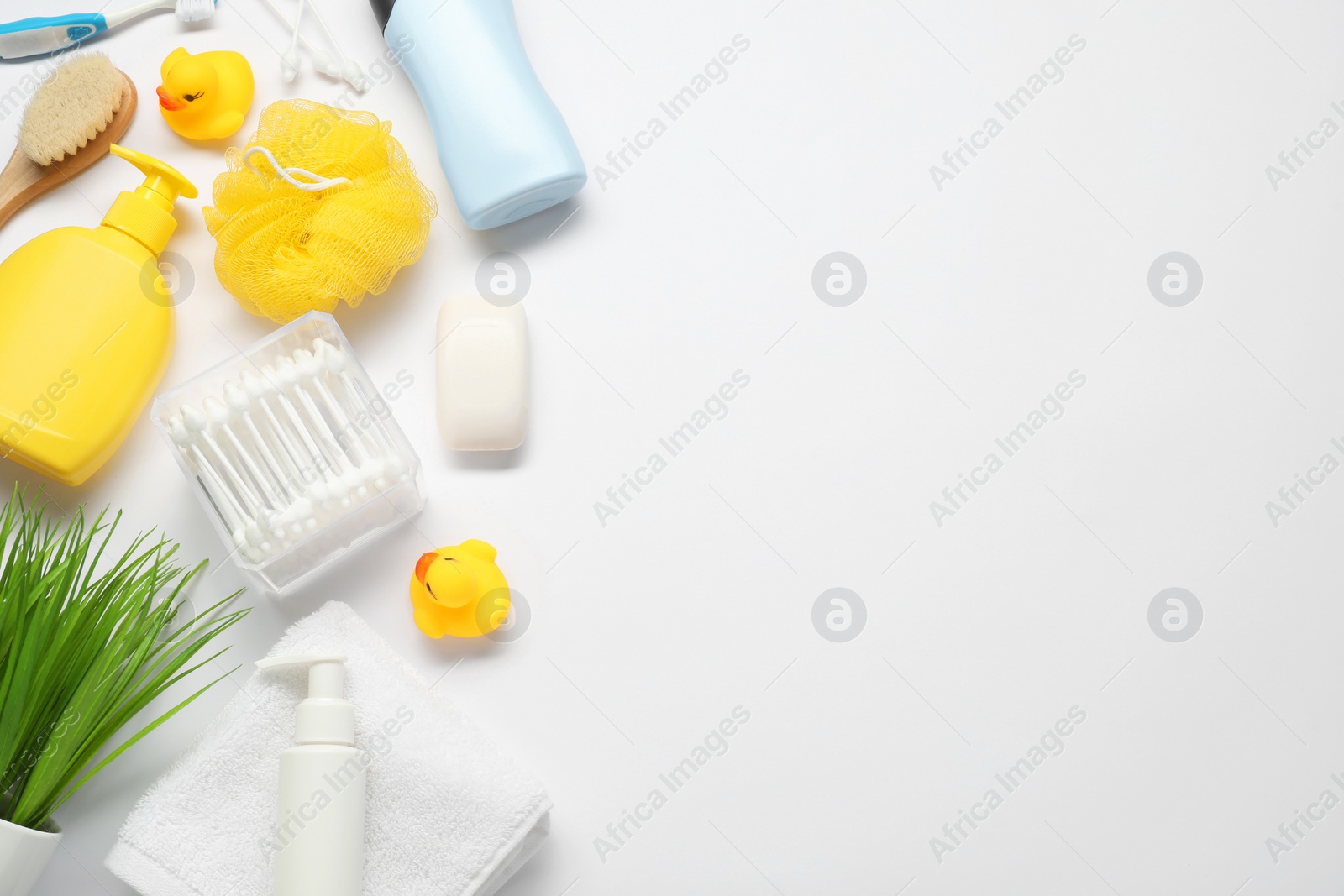 Photo of Baby bath accessories and care products on white background, flat lay. Space for text