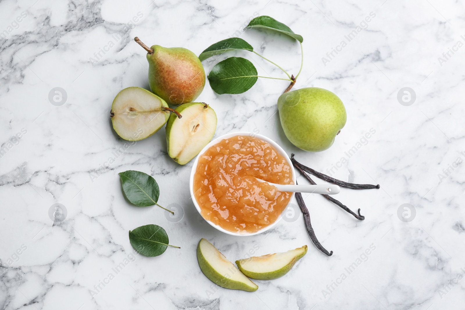 Photo of Delicious pear jam and fresh fruits on white marble table, flat lay
