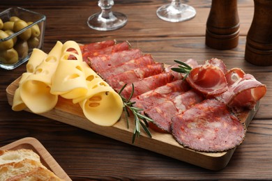 Delicious charcuterie board served on wooden table