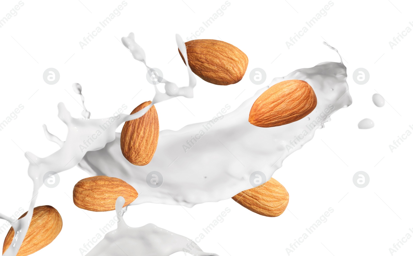 Image of Delicious almond milk and nuts on white background