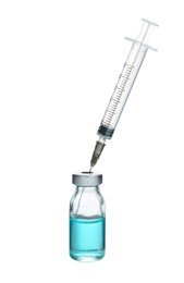 Photo of Syringe with vial of medicine isolated on white