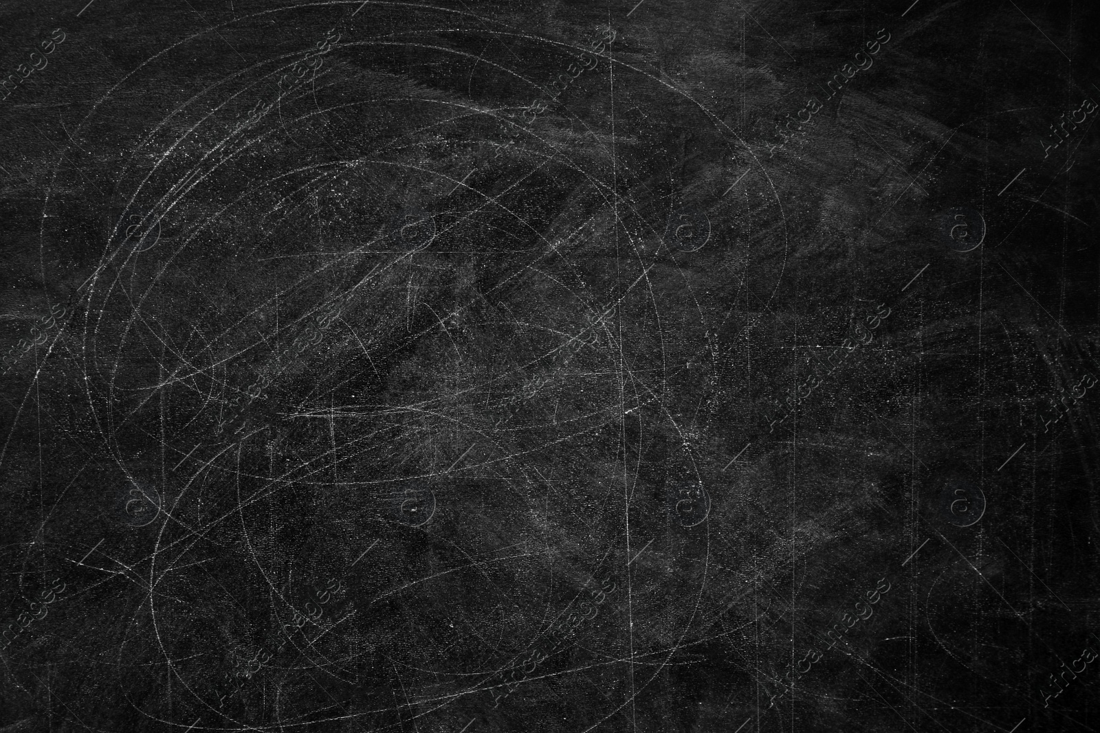 Photo of Chalk rubbed out on blackboard as background. Space for text