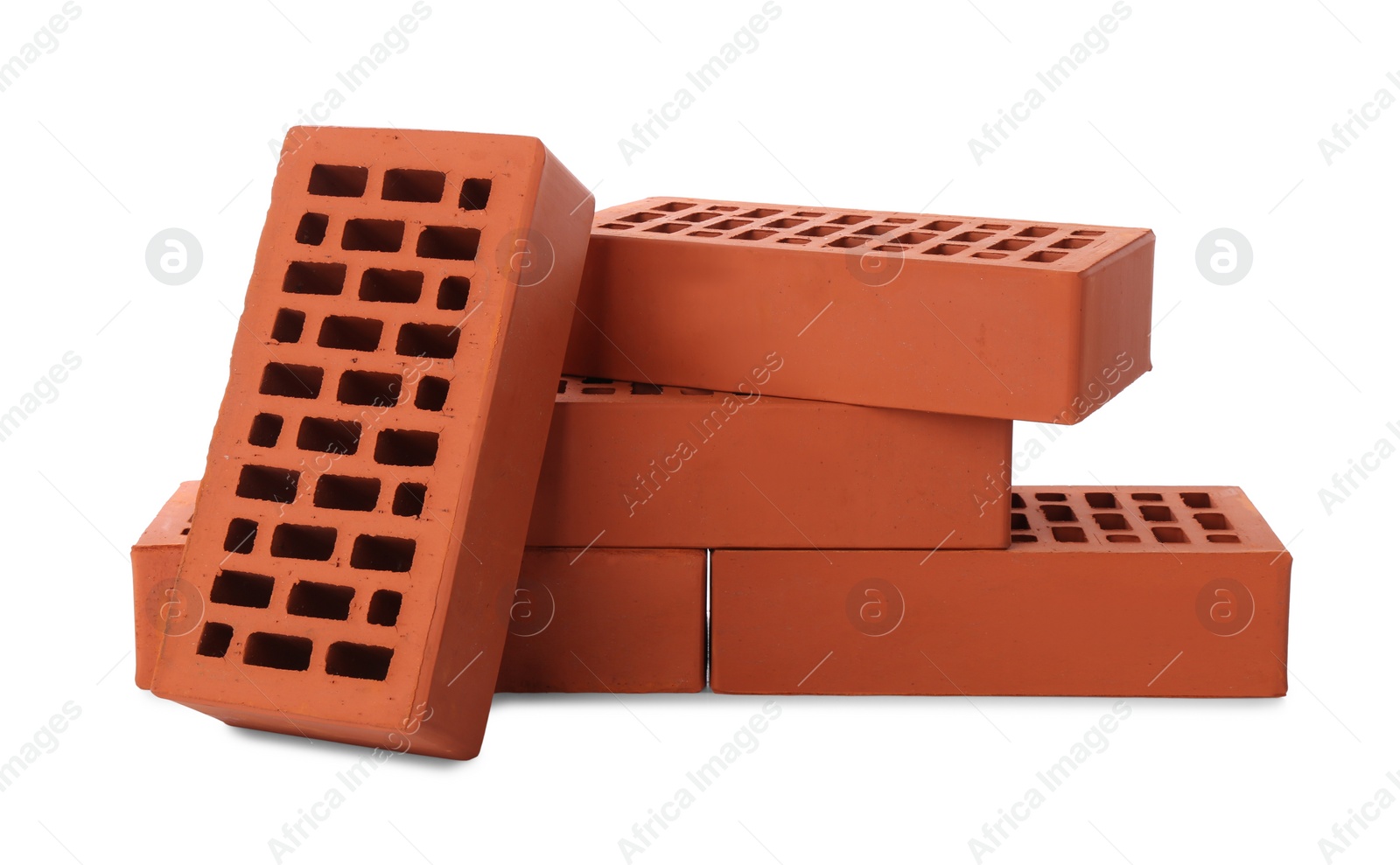 Photo of Many red bricks on white background. Building material