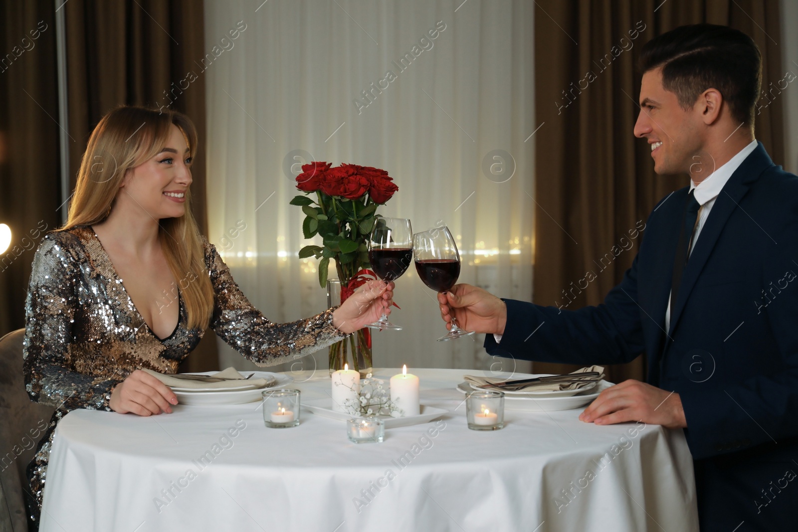 Photo of Lovely couple having romantic dinner in restaurant