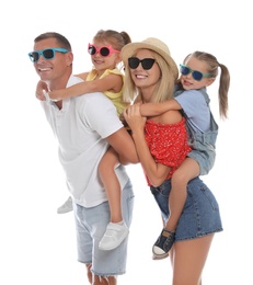 Photo of Happy family with children wearing sunglasses on white background