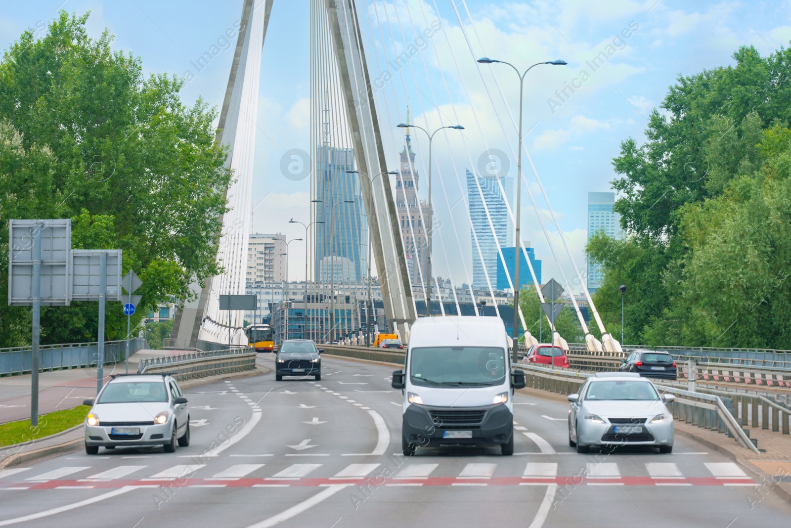 Photo of Beautiful view of city bridge with cars on sunny day