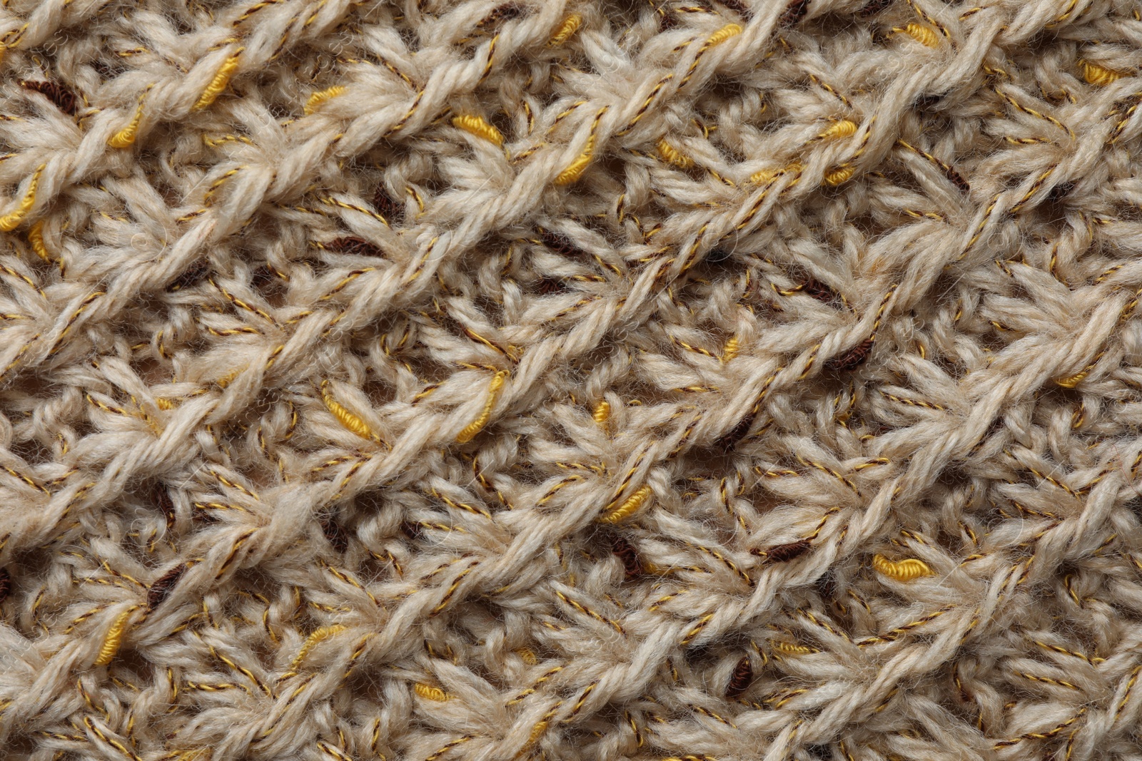 Photo of Texture of knitted fabric as background, top view