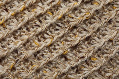 Photo of Texture of knitted fabric as background, top view