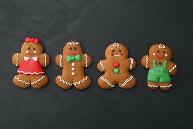 Photo of Different delicious Christmas cookies on black table, flat lay