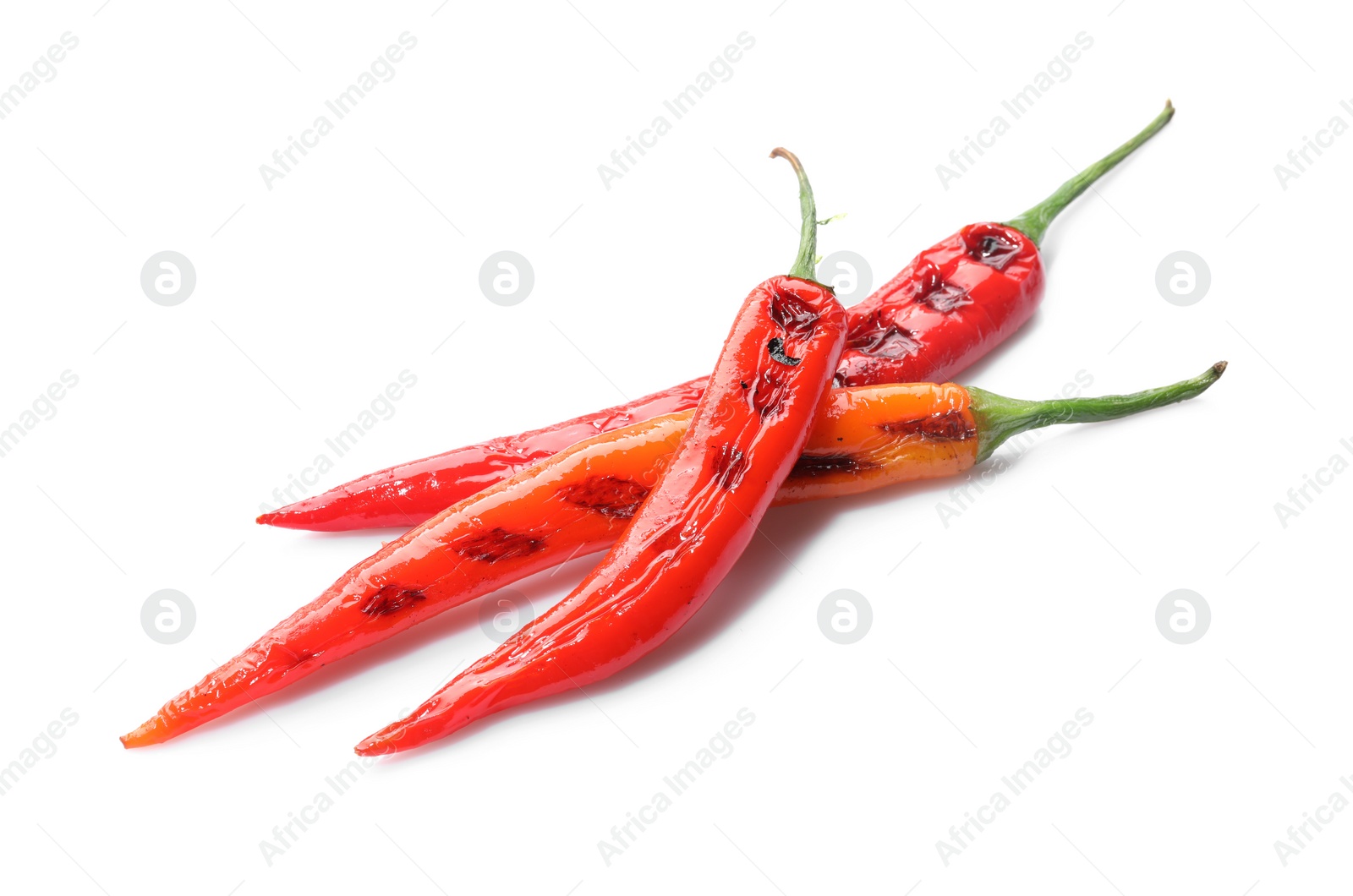 Photo of Tasty grilled chili peppers isolated on white