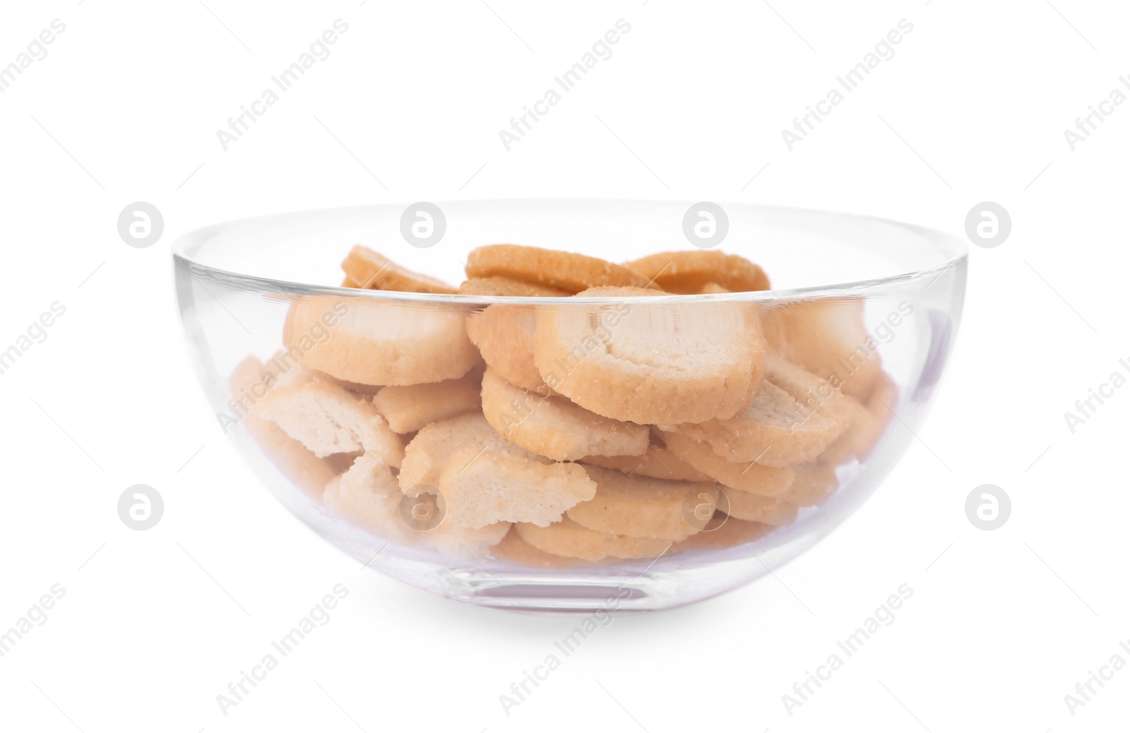 Photo of Delicious crispy rusks in glass bowl on white background