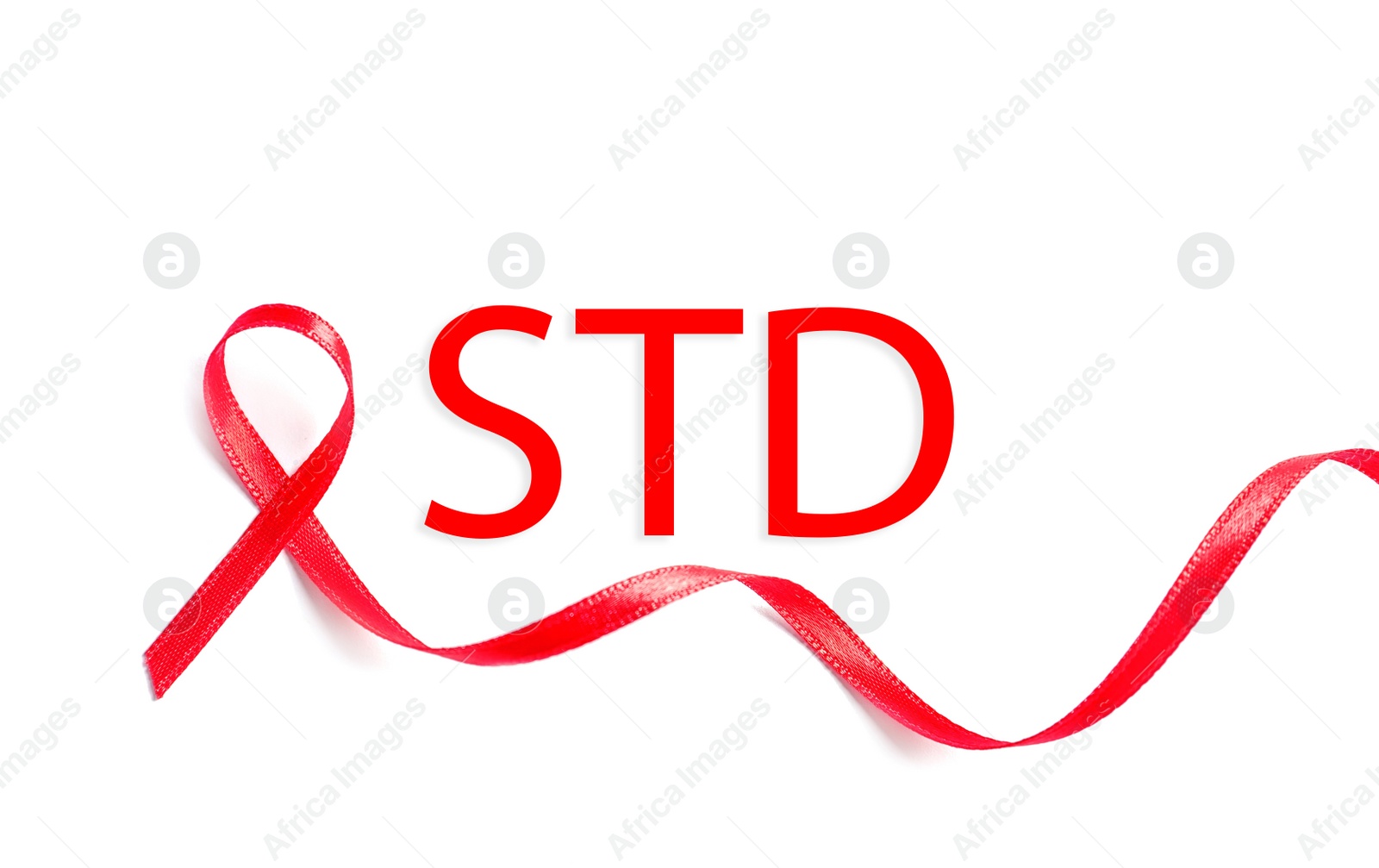 Image of Red awareness ribbon and abbreviation STD on white background, top view 