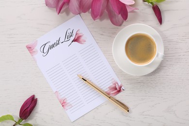 Guest list, coffee, pen and beautiful flowers on white wooden table, flat lay. Space for text