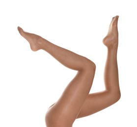 Photo of Woman with beautiful long legs wearing tights on white background, closeup