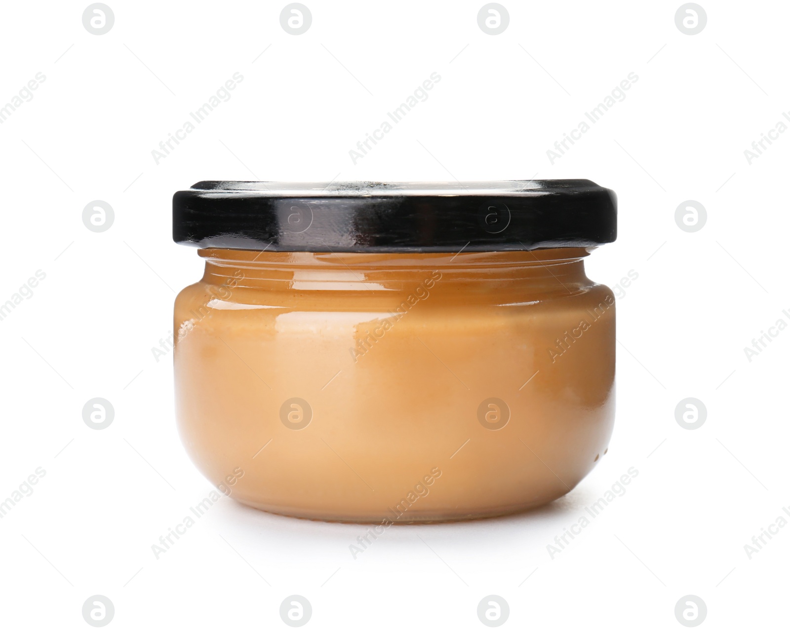 Photo of Jar with creamy peanut butter on white background