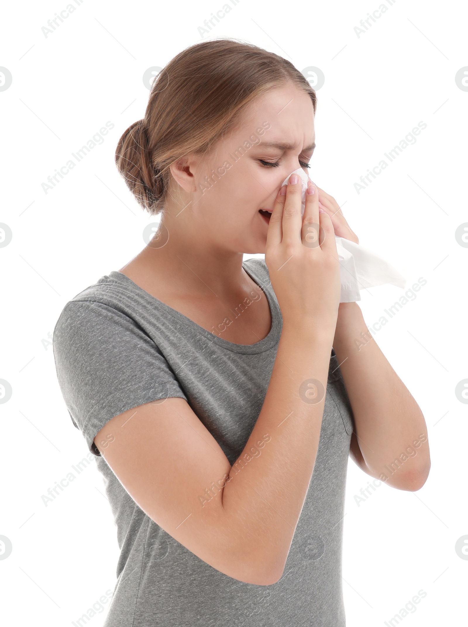 Photo of Young woman suffering from allergy on white background