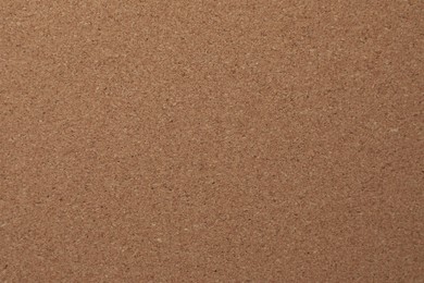 Photo of Texture of cork board as background, closeup view