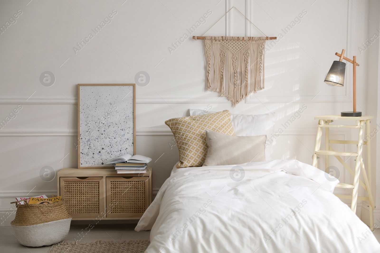 Photo of Comfortable bed with clean white linens indoors