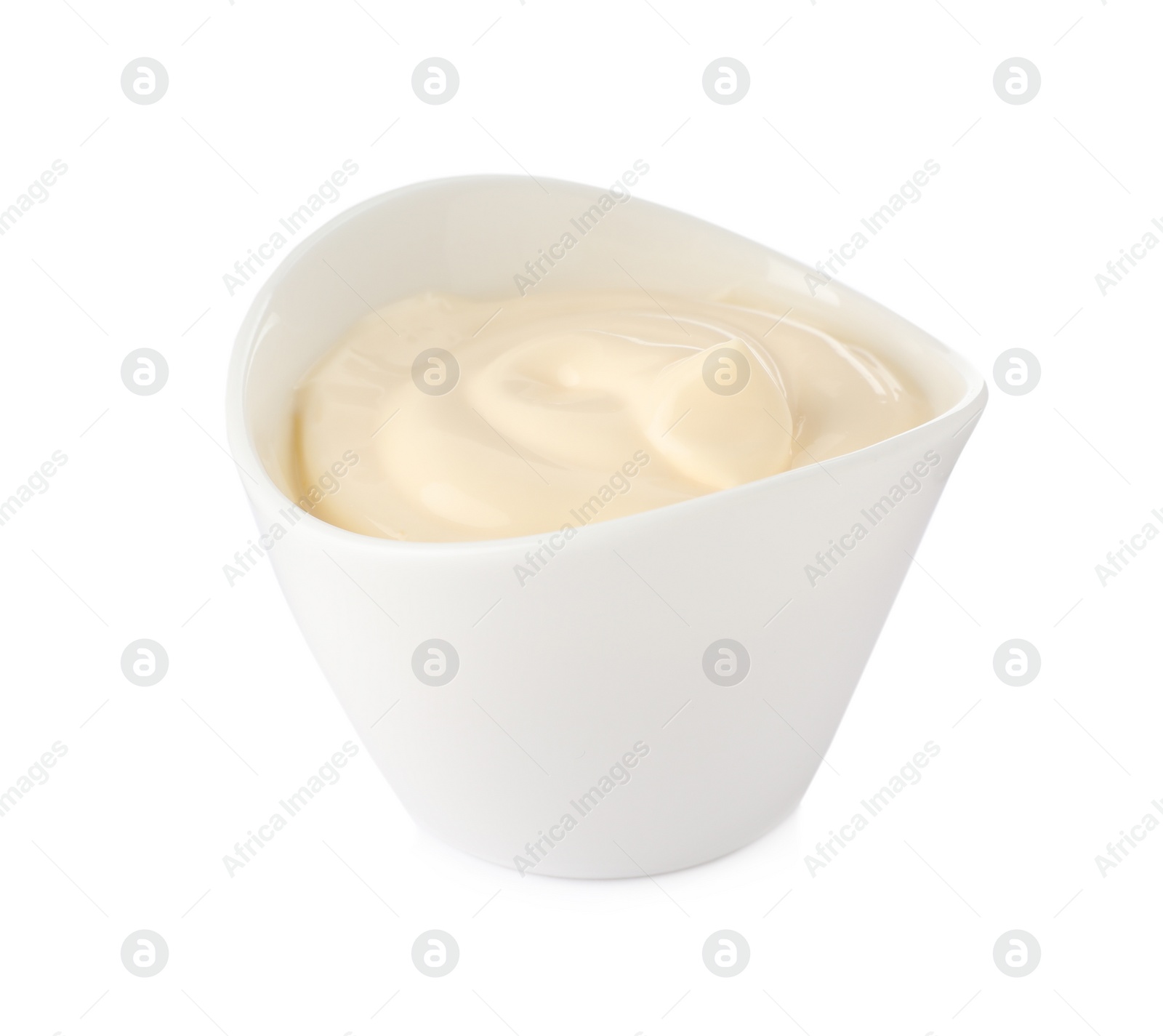 Photo of Mayonnaise in ceramic bowl isolated on white