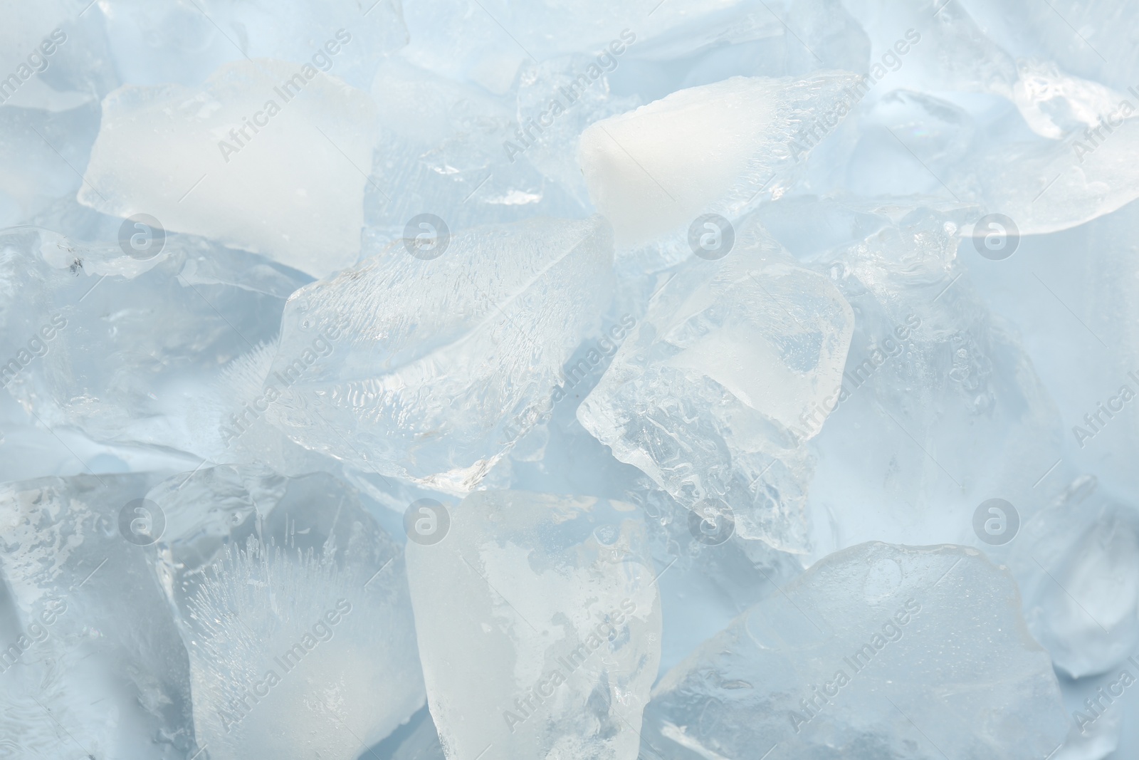 Photo of Pieces of crushed ice as background, closeup