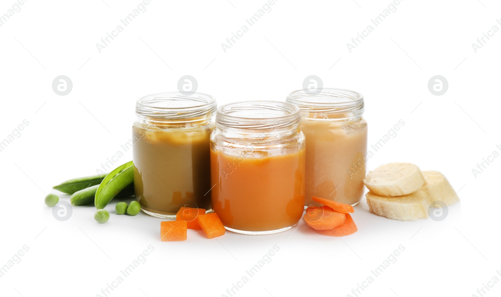 Photo of Jars with healthy baby food and ingredients on white background