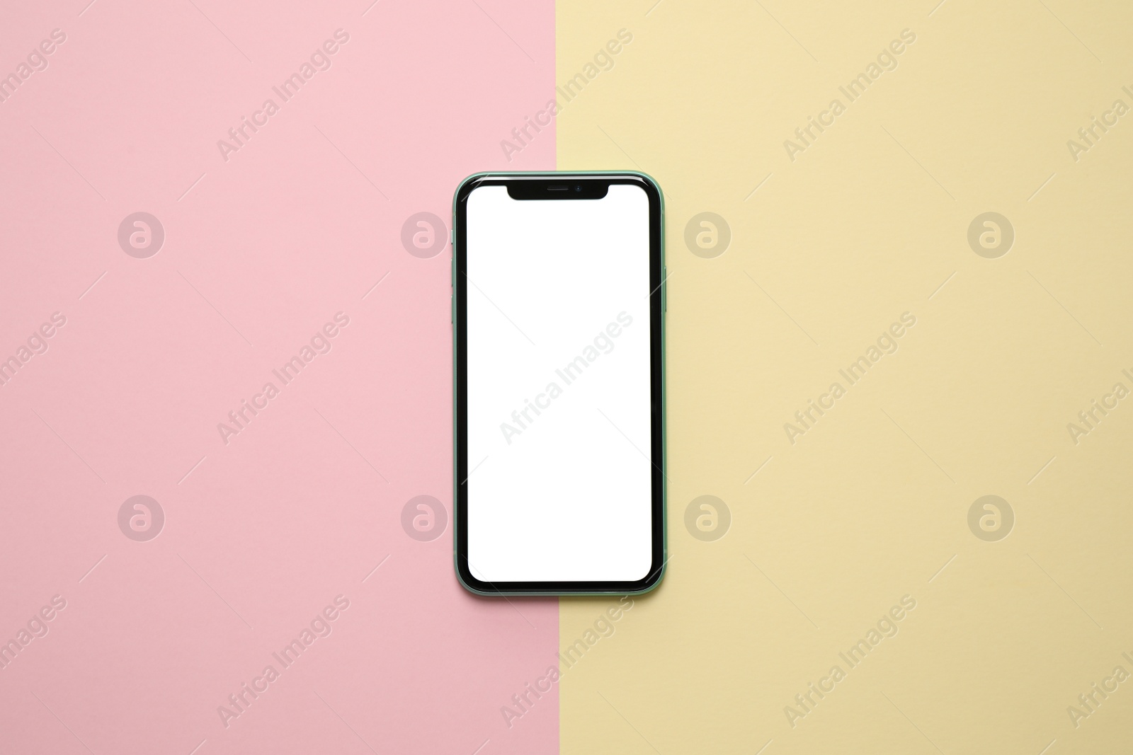 Photo of MYKOLAIV, UKRAINE - JULY 07, 2020: iPhone 11 on color background, top view. Mockup for design