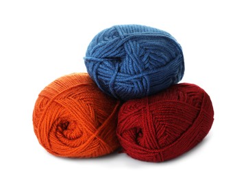 Photo of Soft colorful woolen yarns on white background