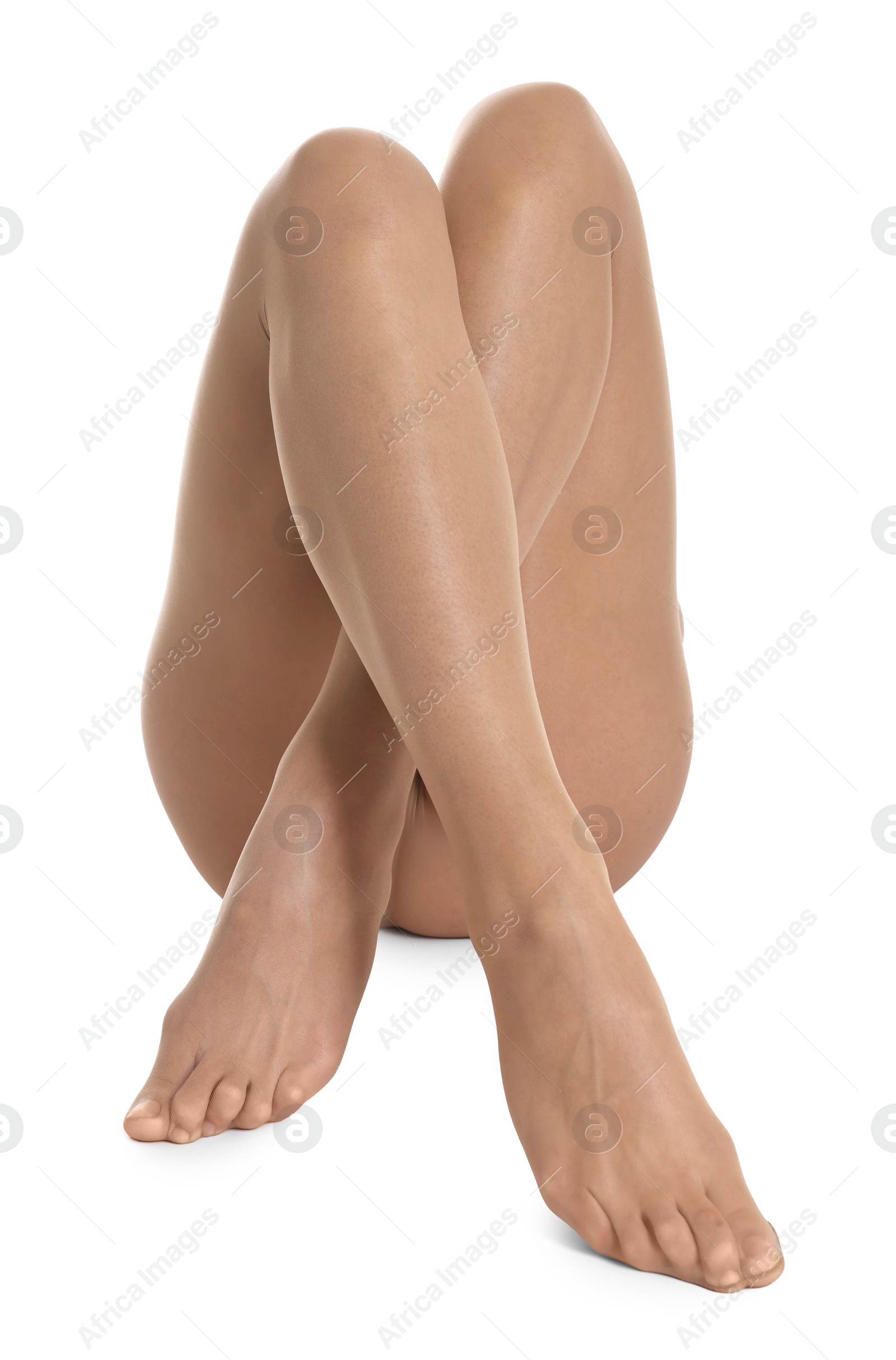 Photo of Woman with beautiful long legs wearing tights on white background