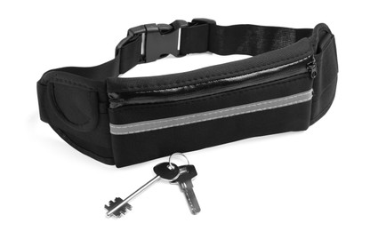 Photo of Stylish black waist bag and keys isolated on white