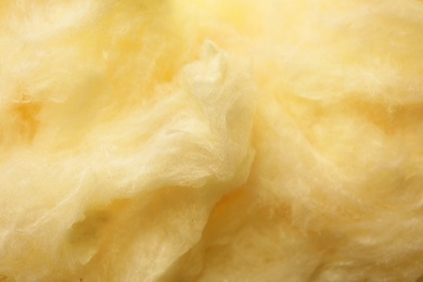 Photo of Fluffy yummy cotton candy as background, closeup