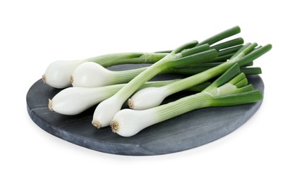 Photo of Board with green spring onions isolated on white