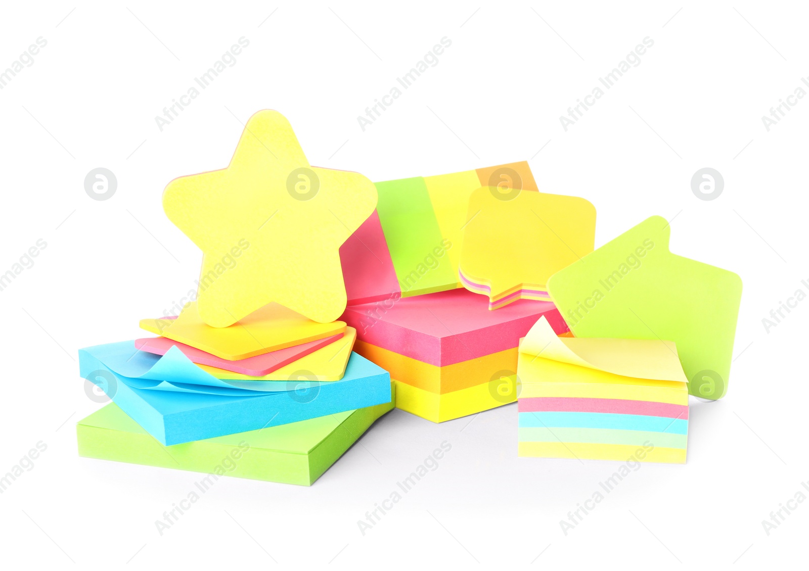 Photo of Pile of different colorful sticky notes on white background. School stationery