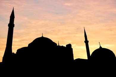 Silhouette of mosque during sunset. Muslim culture
