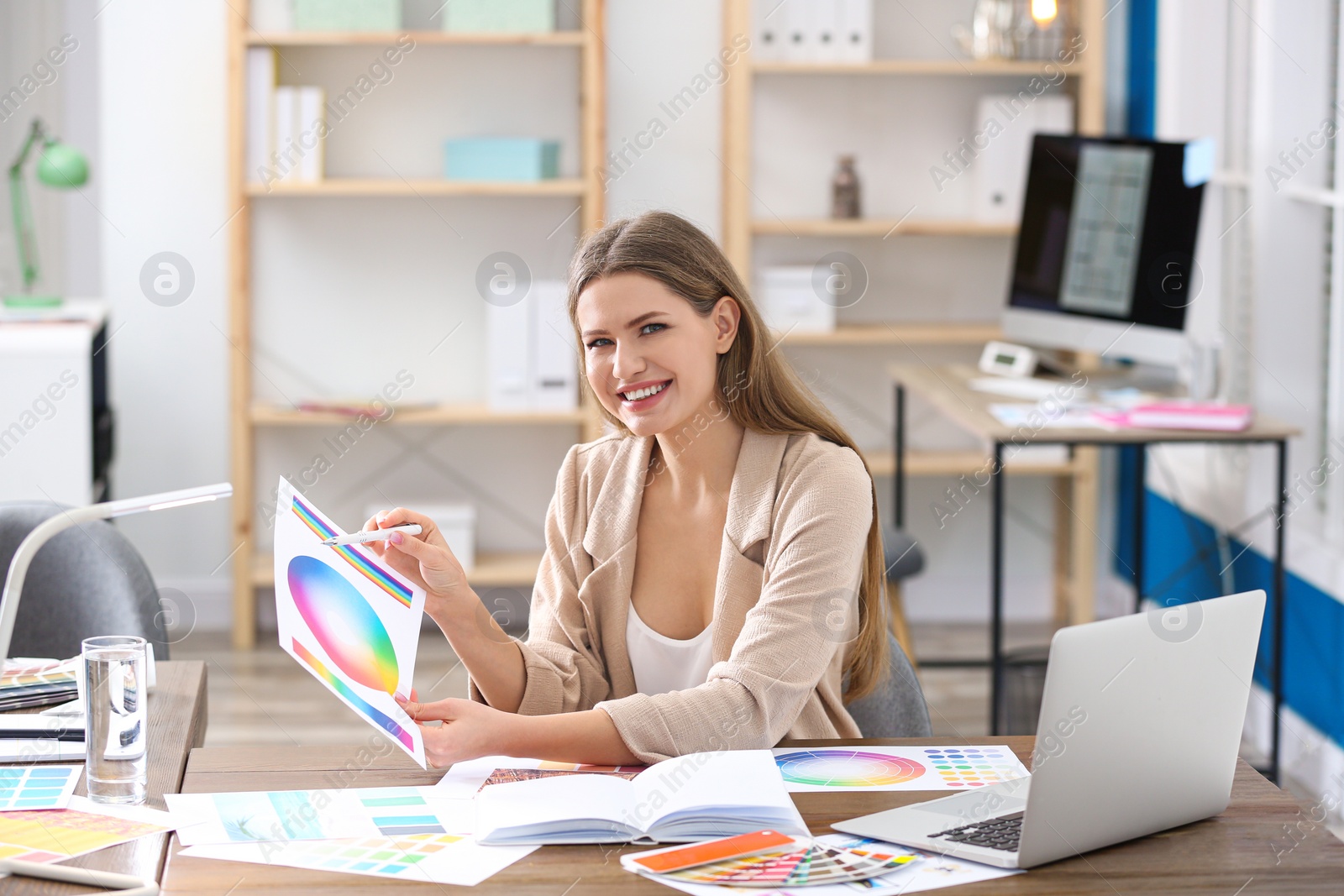 Photo of Professional interior designer at workplace in office