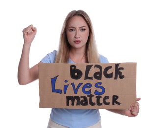 Photo of Emotional young woman holding sign with phrase Black Lives Matter on white background. End racism