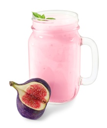 Delicious fig smoothie in mason jar on white background