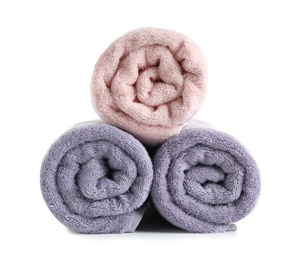 Photo of Fresh soft rolled towels isolated on white