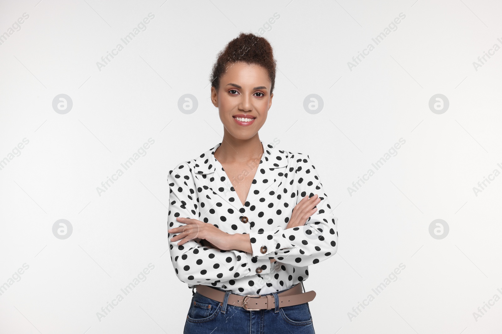 Photo of Portrait of beautiful young woman on white background