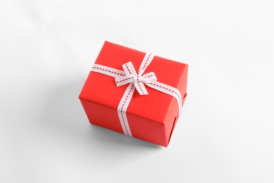 Beautifully wrapped gift box on white background